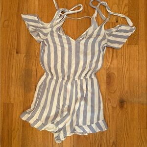 Blue and white striped romper with tie back and adjustable straps